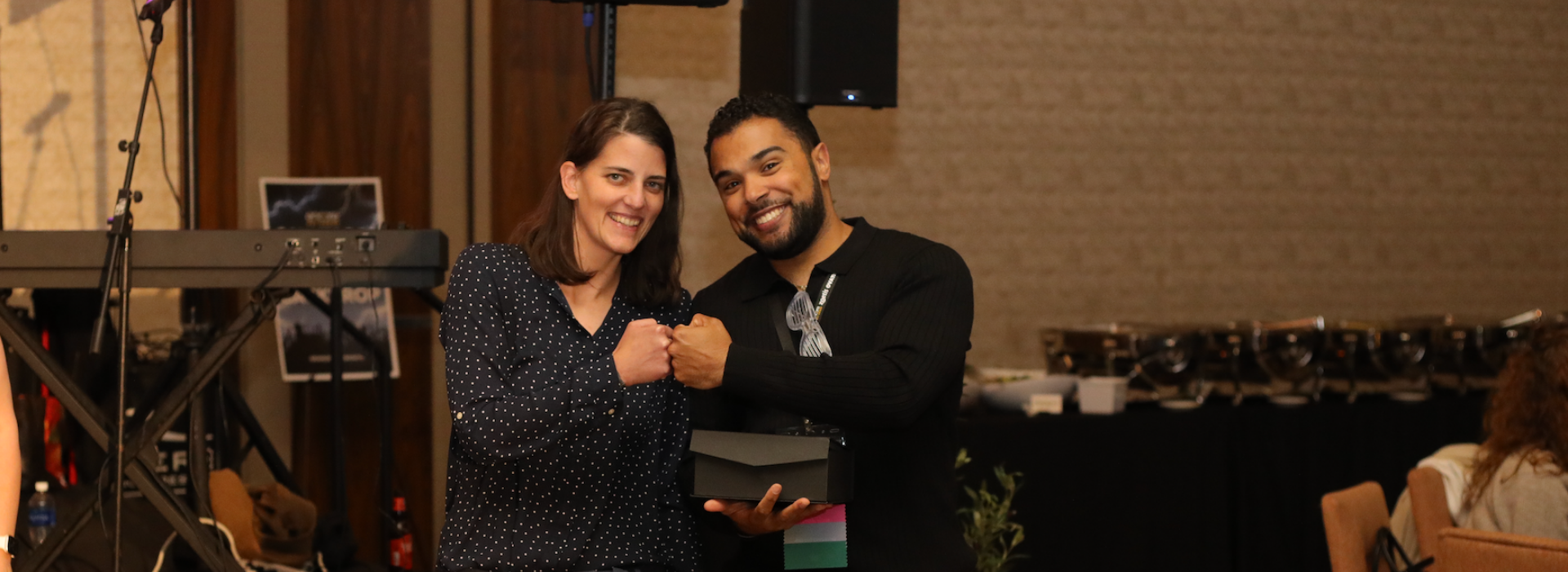 Image of practice leaders from Alexandria Animal Hospital of Fort Hunt accepting their award at Ovation 2025