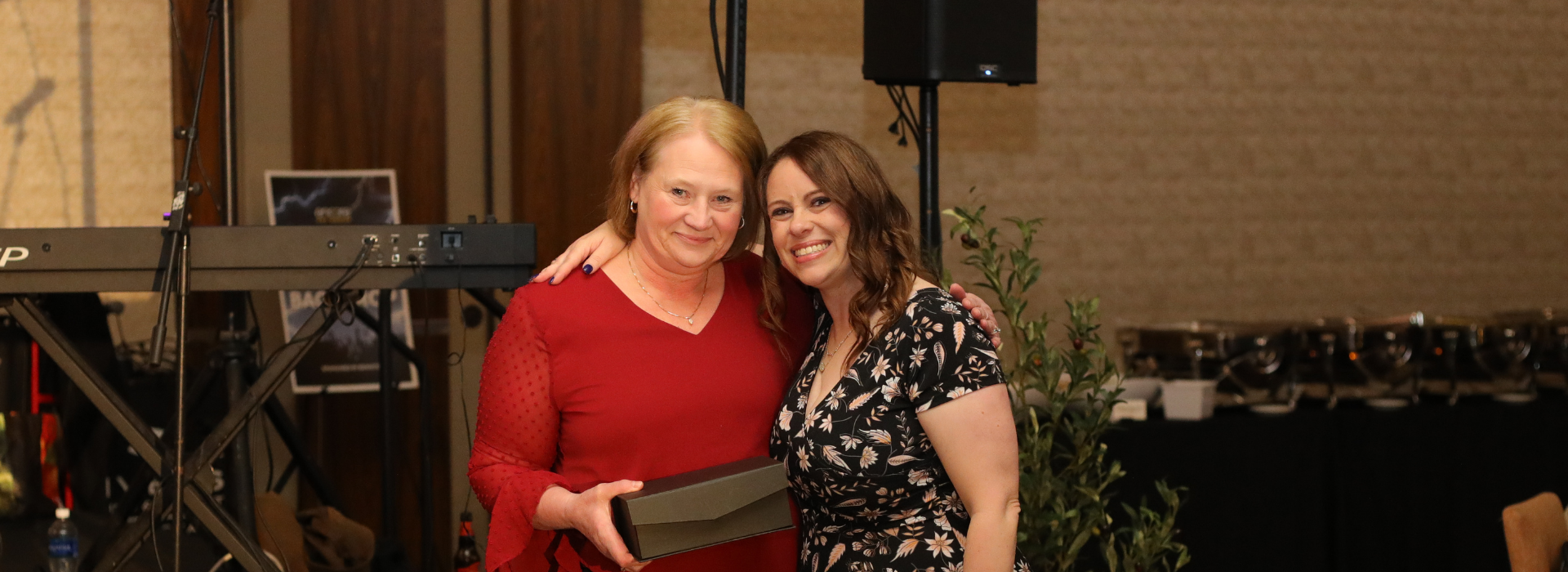 Image or practice leader from Vestal Veterinary Hospital accepting their award at Ovation 2025