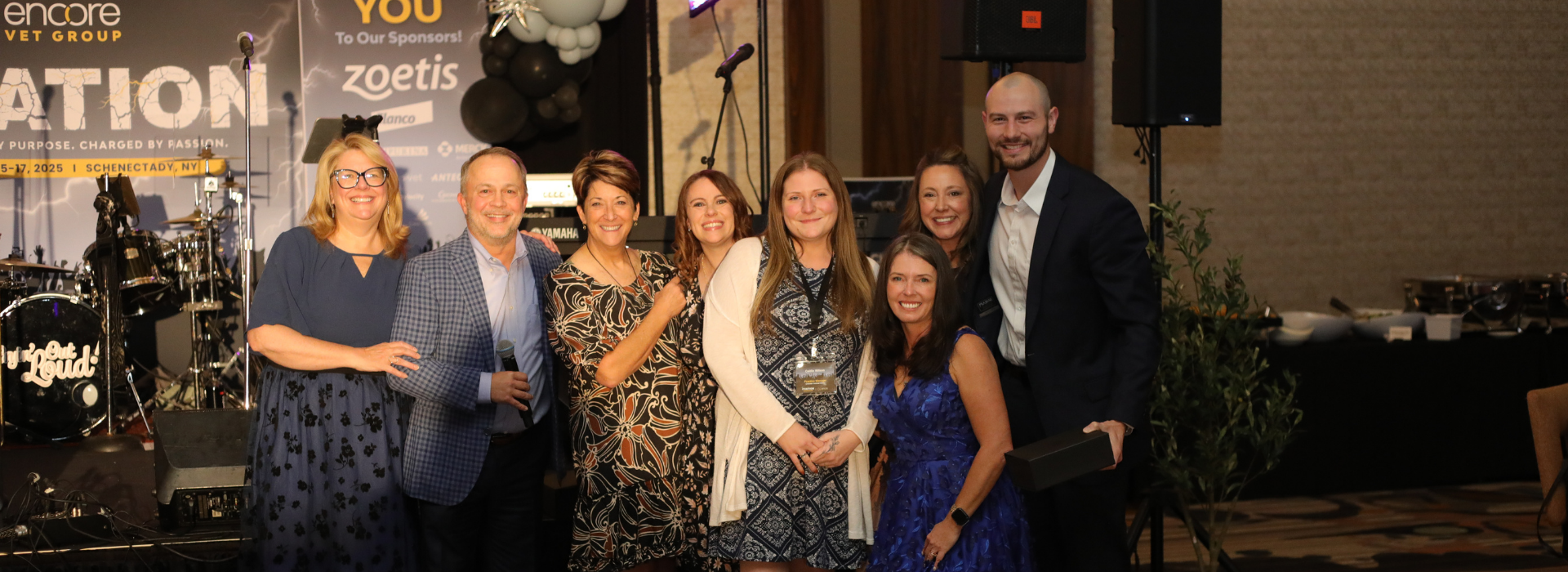 Image of leaders from Chester Animal Clinic accepting their award during Ovation 2025